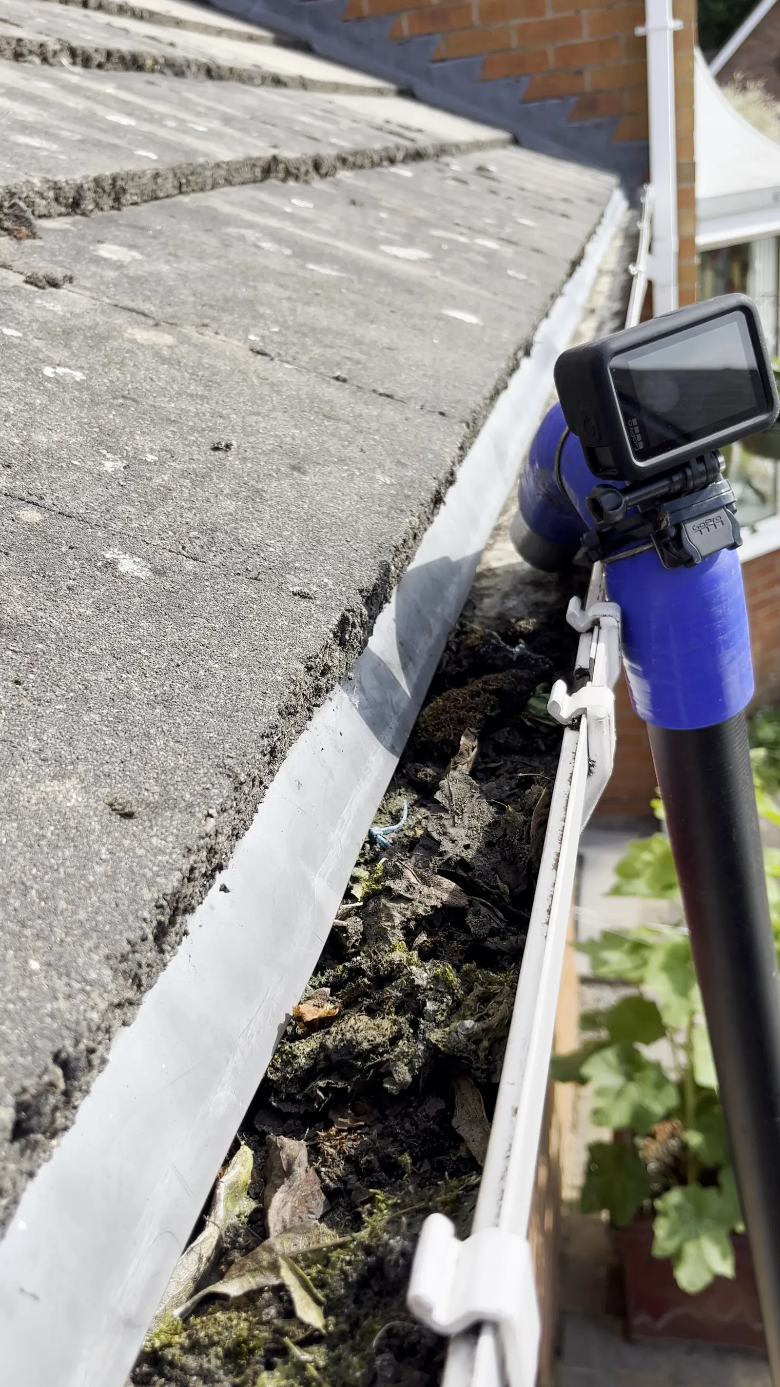 GoPro camera mounted on the SkyVac pole surveying a gutter in Bromsgrove