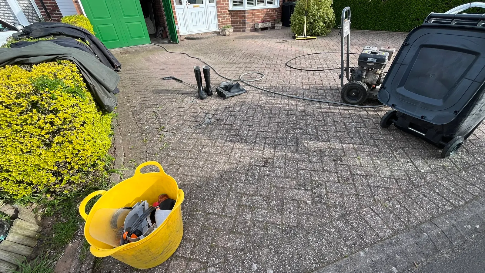 Jet washing kit set up on a driveway