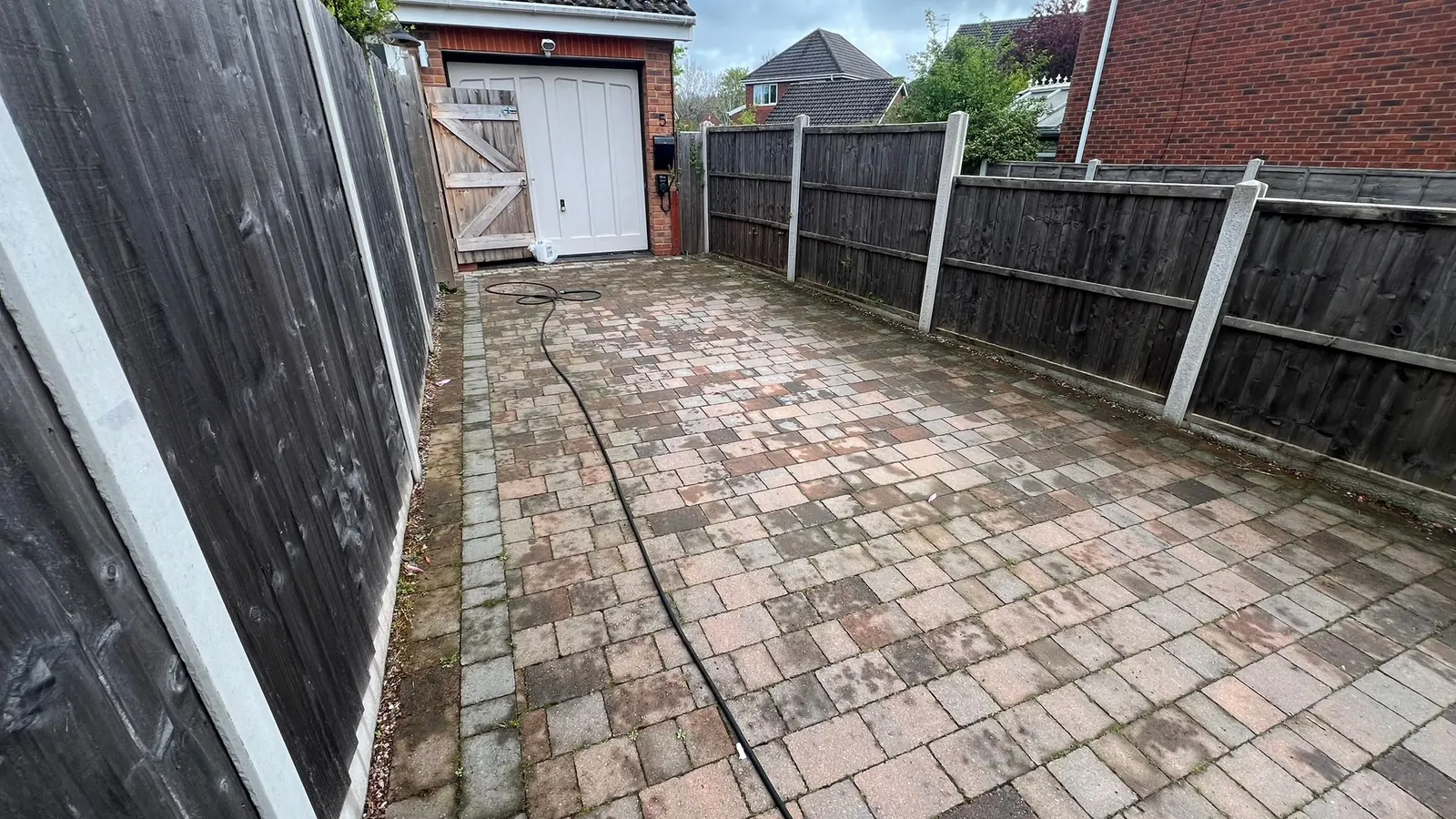 Long block driveway before cleaning