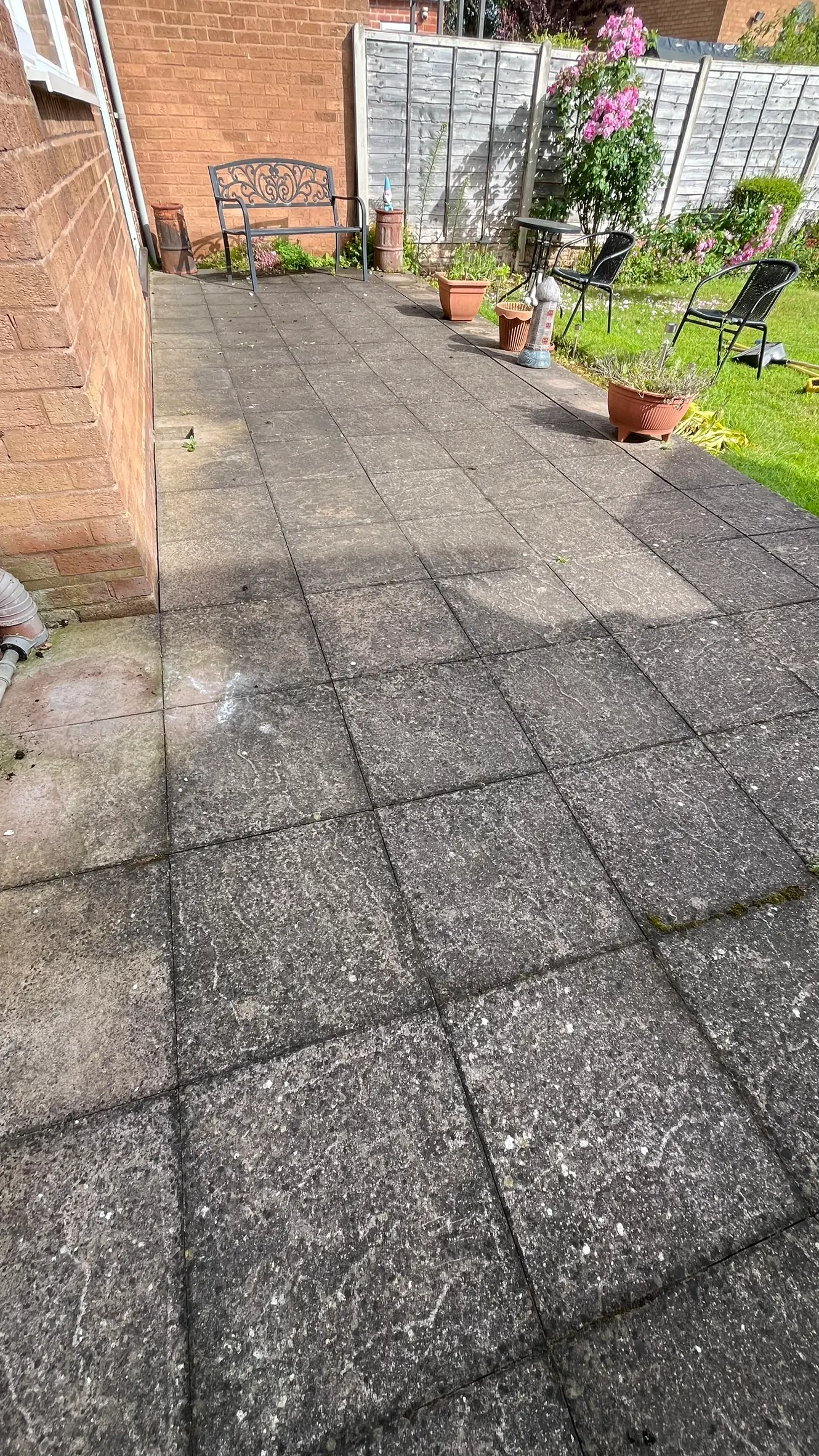 Patio slabs before jet washing
