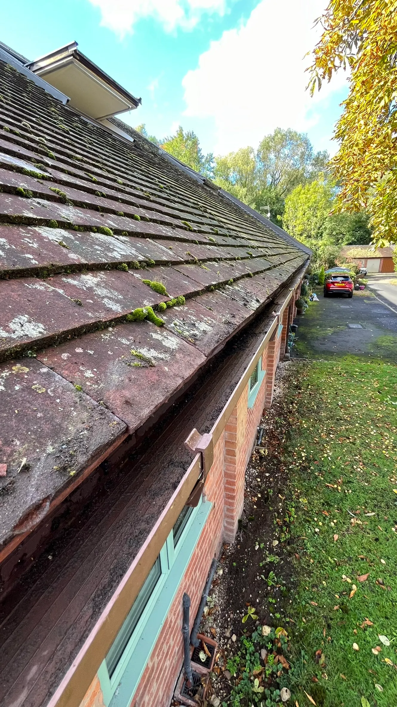 Gutter full of silt and debris before cleaning in Bromsgrove